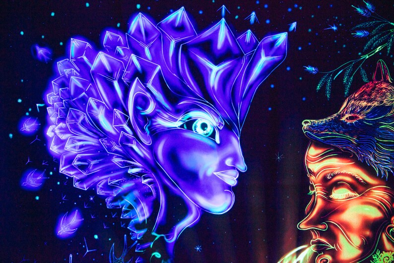 May include: A black background with two faces painted in neon colors. The face on the left is a woman with a crystal crown and blue and purple hair. The face on the right is a woman with a fox head and orange and green hair.