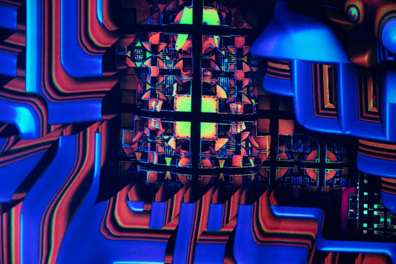 May include: Abstract geometric pattern with a grid of squares and rectangles in shades of red, orange, blue, and green. The pattern is layered and overlapping, creating a sense of depth and dimension.