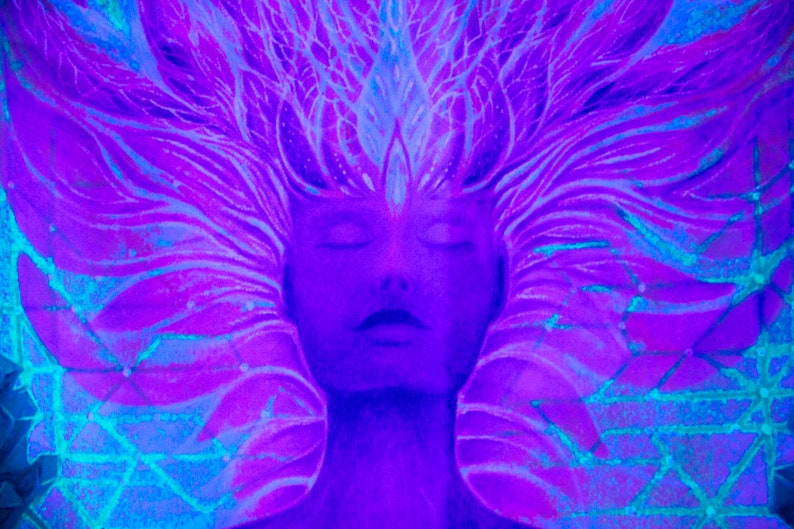 May include: A digital painting of a person with their eyes closed. The person's head is surrounded by a swirling, abstract design in shades of purple and blue.