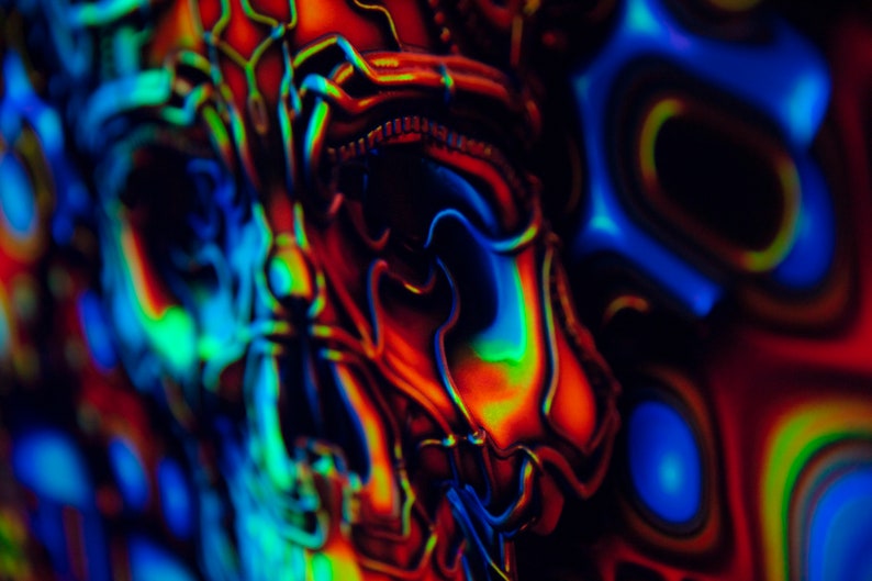 May include: Abstract art with swirling patterns in shades of blue, green, red, and orange.