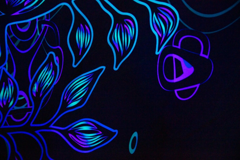 May include: Abstract floral design with blue and purple lines on a black background.