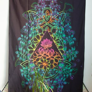 May include: A black tapestry with a rainbow-colored design of a triangle with a lotus flower inside, surrounded by leaves and vines.