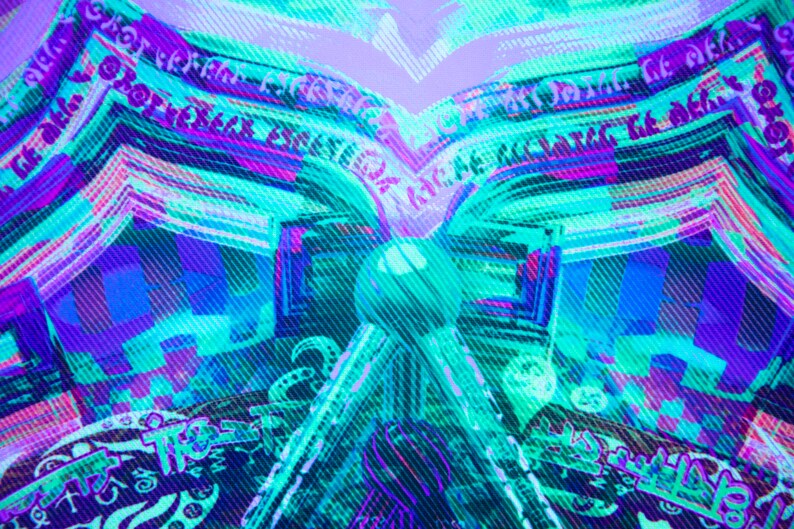 May include: Abstract digital art with a blue, purple, and green color scheme. The image features a repeating pattern of lines and shapes, creating a sense of depth and movement. The text "Ghost Version" is visible in the upper left corner of the image.