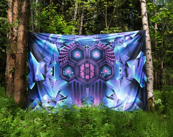 May include: A large tapestry with a geometric design in shades of blue, purple, and pink. The design features a central hexagonal shape with smaller hexagonal shapes surrounding it. The tapestry is hanging in a forest setting.