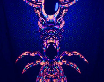 May include: A black background with a neon pink, blue, and green alien-like creature with a large head and multiple tentacles.