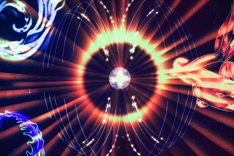 May include: Abstract digital art with a glowing orb in the center surrounded by radiating lines of light. The background is dark with hints of blue and red.