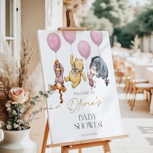 Cartello di benvenuto per baby shower a tema Winnie the Pooh, poster con orsetto e palloncino rosa, modello Canva modificabile immagine 2
