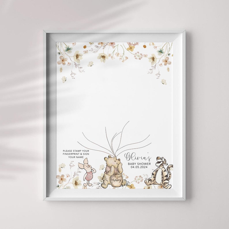 May include: A Winnie the Pooh themed baby shower guest book with a floral border. The guest book features a tree with branches for guests to sign and leave their fingerprints. The text reads "Olivia's Baby Shower 04.05.2024".