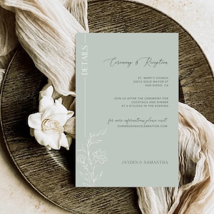 May include: A light green wedding invitation card with details for the ceremony and reception at St. Mary's Church in San Diego, California. The card includes the time and date of the event, as well as the website for more information. The card is decorated with a simple floral design.
