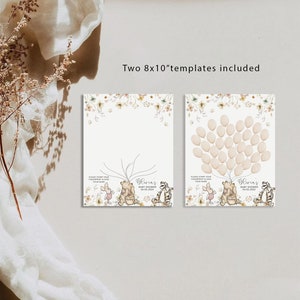 May include: Two 8x10 inch printable templates for a baby shower. The templates feature Winnie the Pooh and Piglet characters with a floral border. One template has a tree with branches for guests to sign their names and the other has a balloon cluster for guests to stamp their fingerprints.