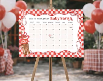 May include: A rectangular sign on a wooden easel featuring a red and white checkered border with a calendar titled GUESS THE ARRIVAL DATE OF Baby Sarah. The calendar includes July and August dates, a soda bottle illustration, and bows.