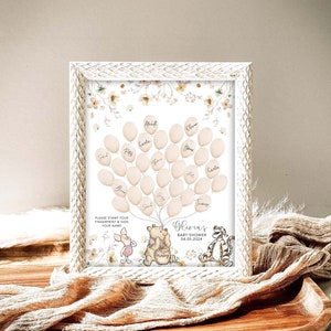 May include: A Winnie the Pooh themed baby shower guest book with a white background and floral accents. The guest book features a tree with balloons for guests to sign their names and leave fingerprints. The text on the guest book reads "Olivia's Baby Shower 04.05.2024".