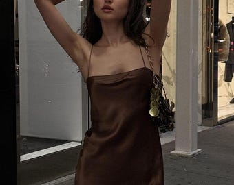 100% mulberry silk satin mini dress with straight neck and spaghetti strap, bias cut. Black, Brown, Pink, Grey, Red, Navy