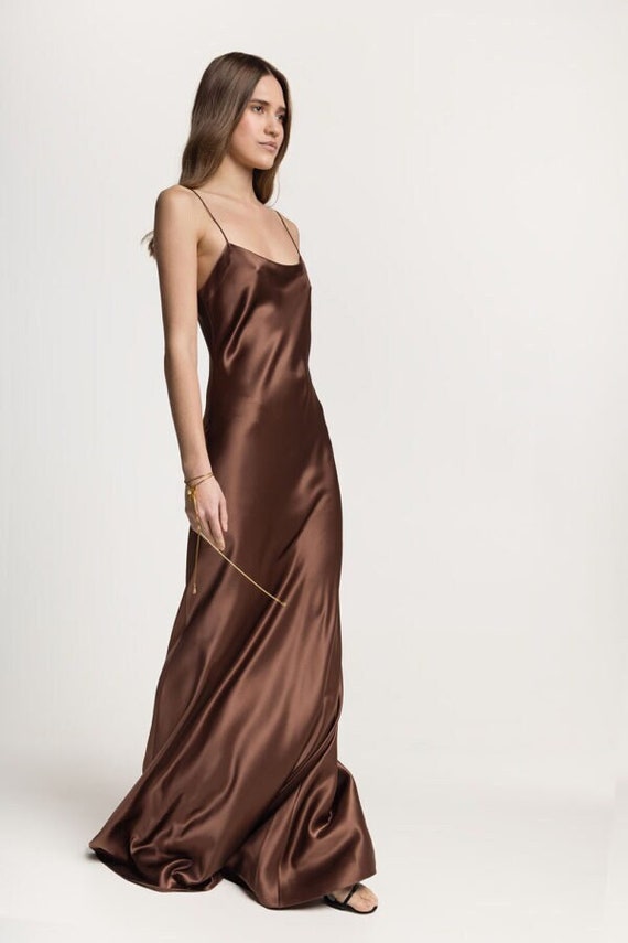 Pronovias - The Brown ball gown with its exquisite guipure... | Facebook
