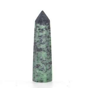 May include: A green and black gemstone point, also known as a crystal, with a pointed tip and a smooth, polished surface.
