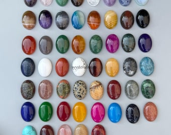 Lotto misto all'ingrosso di 24 pezzi da 25 mm, pietre preziose multicolori, cabochon ovali a fondo piatto.