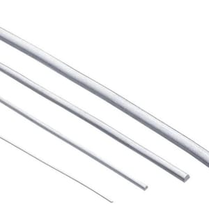May include: Four silver metal rods of varying thicknesses are angled diagonally across a white background. The rods appear to be made of a shiny, reflective material, with a rounded edge on the thickest rod.