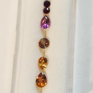 MIXED GEM LOT 2.34 ct color change garnet, andalucite, malayan garnet, pyrope garnet