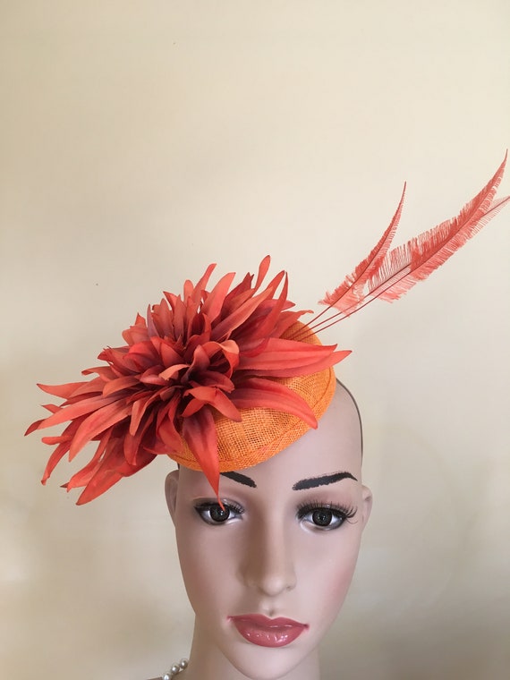 orange hats and fascinators
