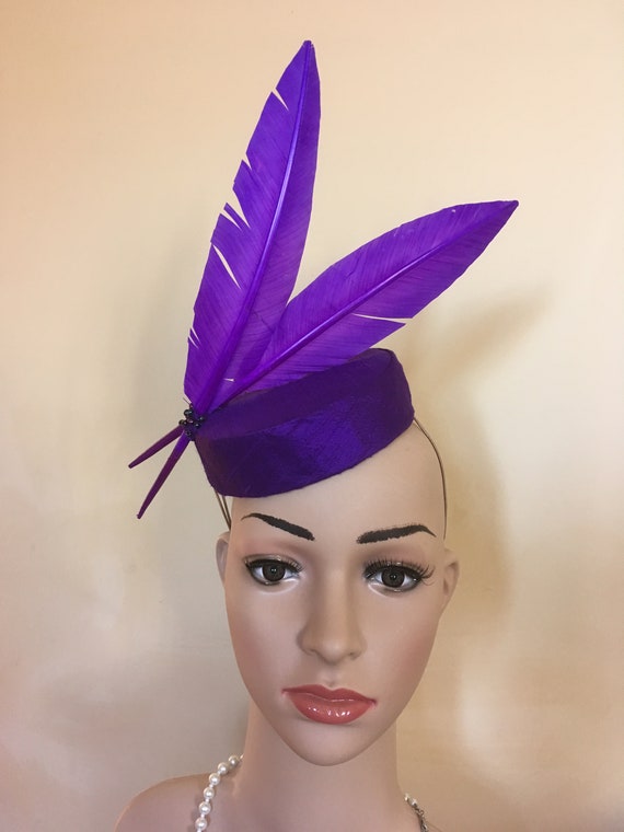 purple wedding hats and fascinators