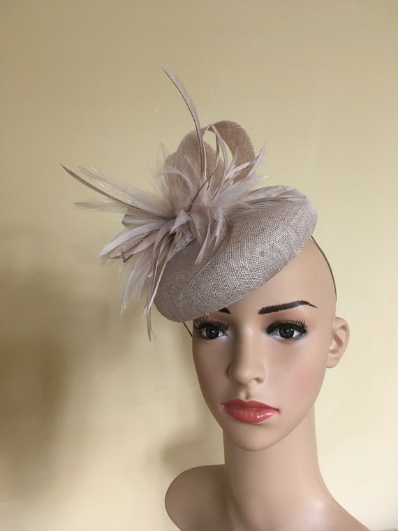 beige hats and fascinators