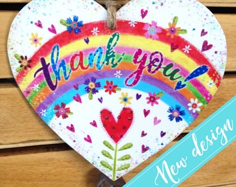 Beautiful 'Thank you!' Rainbow heart gift. Pretty illustration detailing hearts and flowers. Option to send direct. Painted bead. Gift wrap.