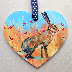 Beautiful summer hare heart. Cornfield and poppy flower art work. wooden keepsake gift to send direct. ribbon to hang it from. gift boxed.