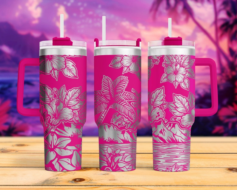 May include: Three pink stainless steel tumblers with a silver floral design. Each tumbler has a lid and a straw. The tumblers have a handle and are perfect for enjoying your favorite beverage.
