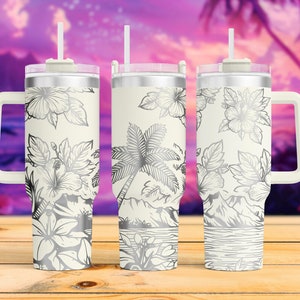May include: Three stainless steel tumblers with a white background and silver hibiscus flower and palm tree design. The tumblers have a handle and a lid with a straw.