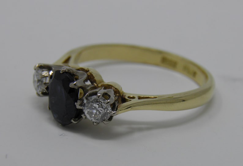 A Classic and beautiful vintage 18ct Sapphire and Diamond Trilogy ring