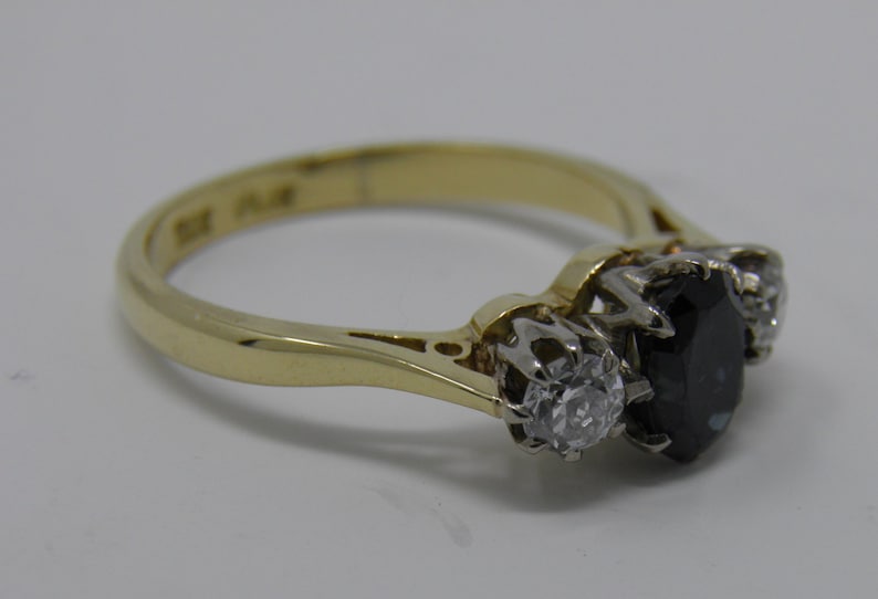 A Classic and beautiful vintage 18ct Sapphire and Diamond Trilogy ring