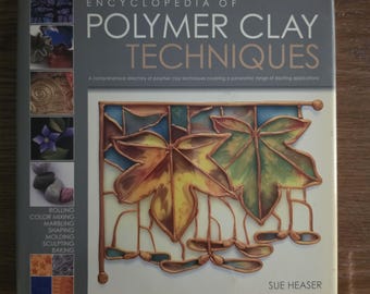 Enciclopedia de técnicas de arcilla polimérica de Sue Heaser, libro de proyectos de tapa dura, 2007.