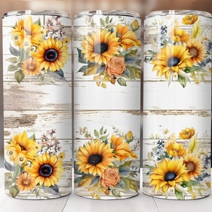 May include: Three stainless steel tumblers with a white woodgrain background and a floral design featuring sunflowers and roses.