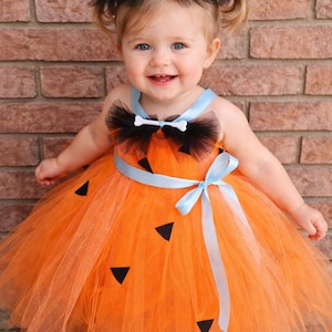 Adorable Pebble Flintstone costume perfect for babies and toddlers. Halloween. Sparkling.
