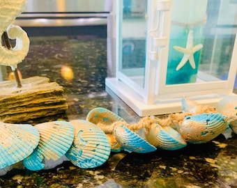 Sea shell garland rustic worn shells bronze patina blue coastal beach decor hanging fireplace mantel centerpiece