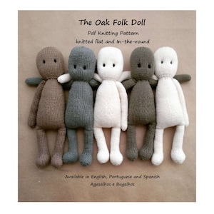 May include: Five knitted dolls in different colours, including brown, grey, white, and green. The dolls are arranged in a row, with their arms around each other. The dolls are all smiling and have black eyes. The text "The Oak Folk Doll" is written above the dolls. The text "Pdf Knitting Pattern" is written below the dolls. The text "knitted flat and In-the-round" is written below the "Pdf Knitting Pattern" text. The text "Available in English, Portuguese and Spanish" is written below the dolls. The text "Agasalhos e Bugalhos" is written below the "Available in English, Portuguese and Spanish" text.