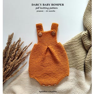 May include: A knitted orange baby romper with wooden buttons. The romper is laid out on a white and green blanket. The text "Darcy Baby Romper" and "pdf knitting pattern" is visible in the image. The text "preemie - 24 months" is also visible.
