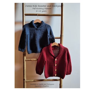 May include: Two knitted children's sweaters, one blue and one red, hanging on a wooden ladder. The red sweater is a cardigan with buttons. The text "Caress Kids Sweater and Cardigan" and "Pdf Knitting Pattern 0-14 years" is above the sweaters. The text "Available in English and Portuguese Agasalhos e Bugalhos" is below the sweaters.