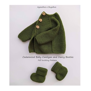 May include: A green knitted baby cardigan with wooden buttons and a matching pair of green knitted booties. The cardigan and booties are laid out on a white surface. The text "Cedarwood Baby Cardigan and Darcy Booties Pdf Knitting Pattern" is printed below the items.