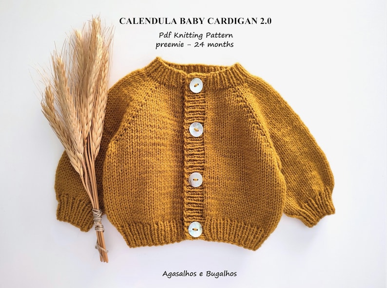May include: A mustard yellow knitted baby cardigan with a button closure. The cardigan is made with a soft yarn and has a classic design. The text "Calendula Baby Cardigan 2.0" and "Pdf Knitting Pattern" is visible at the top of the image.