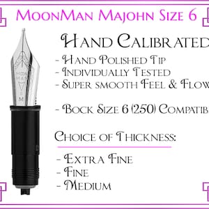 May include: A silver and black fountain pen nib with the words "MOONMAN" and "M" on it. The nib is labeled "HAND CALIBRATED" and says "HAND POLISHED TIP", "INDIVIDUALLY TESTED", "SUPER SMOOTH FEEL & FLOW", "BOCK SIZE 6 (250) COMPATIBLE", and "CHOICE OF THICKNESS: EXTRA FINE, FINE, MEDIUM".