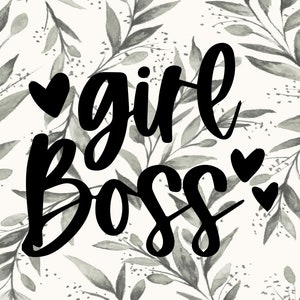 May include: Black and white graphic design with the text "girl boss" and three hearts. The design is on a white background with a watercolor pattern of gray leaves.