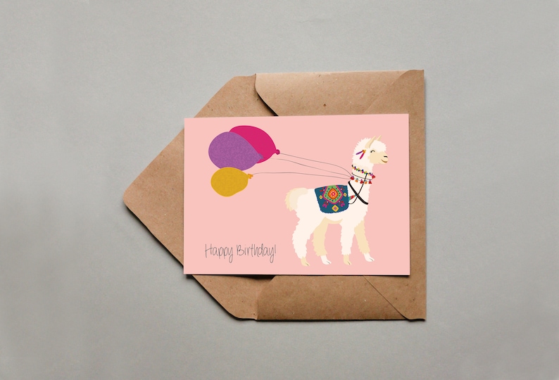 May include: A pink birthday card with a white llama wearing a colorful saddle and carrying three balloons. The balloons are purple, pink, and yellow. The card says "Happy Birthday!"