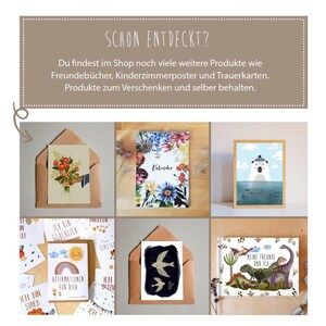 May include: Assortment of greeting cards with various designs, including a floral calendar, a polar bear in the ocean, a rainbow with the text "Affirmations for you", and a card with two birds. The cards are displayed on a light brown surface.