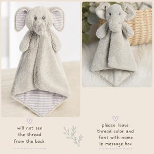 May include: A plush gray elephant security blanket with striped accents. The elephant has large ears and a trunk. The blanket has a soft, textured appearance. The text in the image says "will not see the thread from the back" and "please leave thread color and font with name in message box."
