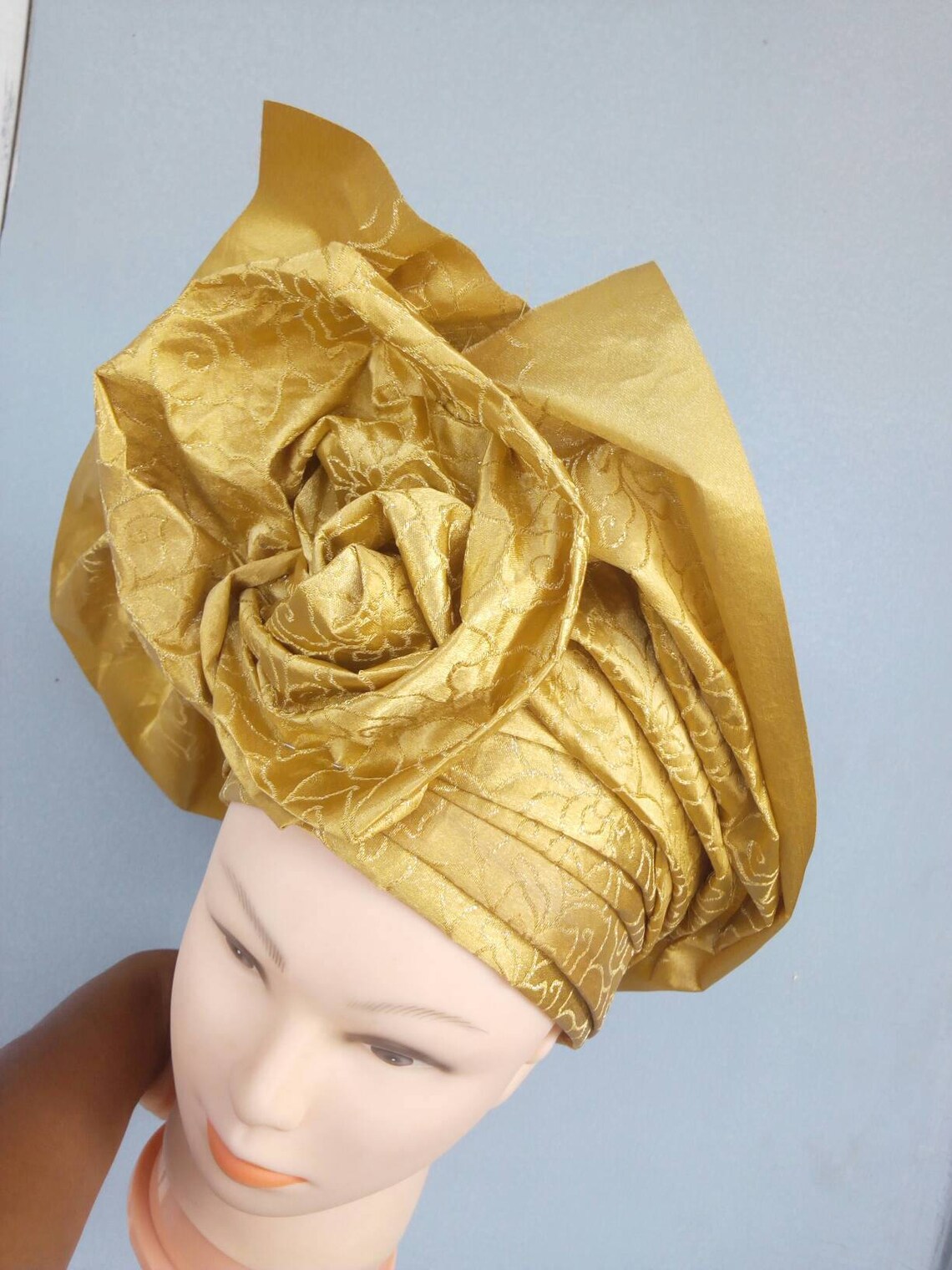 white lace and gold gele