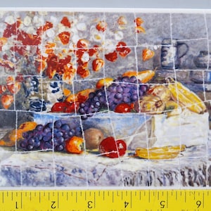 May include: A still life painting featuring a vibrant arrangement of fruits and flowers. The composition includes grapes, apples, bananas, and a vase of red and orange flowers. The artwork is set against a soft, textured background.