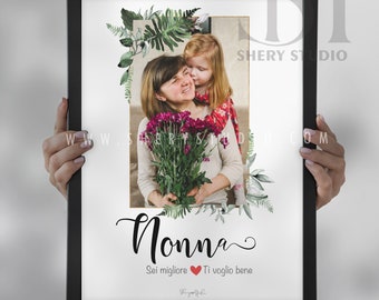May include: A framed print with a photo of a woman and a child. The photo is surrounded by a floral design. The text "Nonna" is written in cursive script. The text "Sei migliore Ti voglio bene" is written below the photo. The text "Shery Studio" is written in the top right corner of the print.