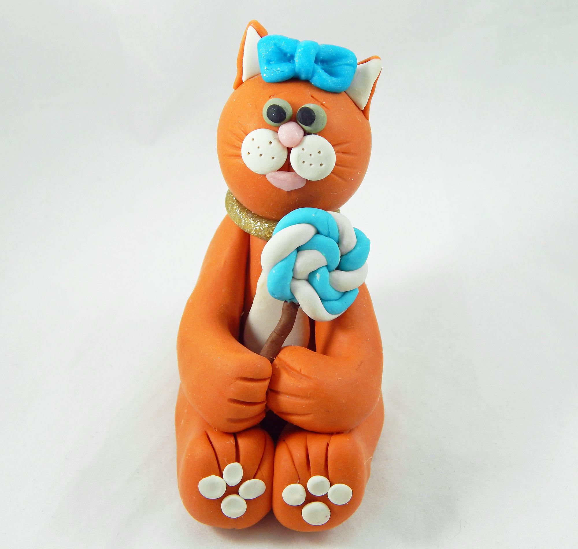 clay cat figurines