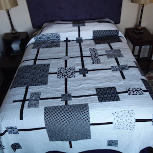 White and black queen quilt